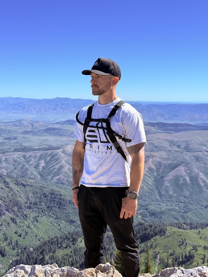 The Vanguard - Mountain summit lifestyle shot